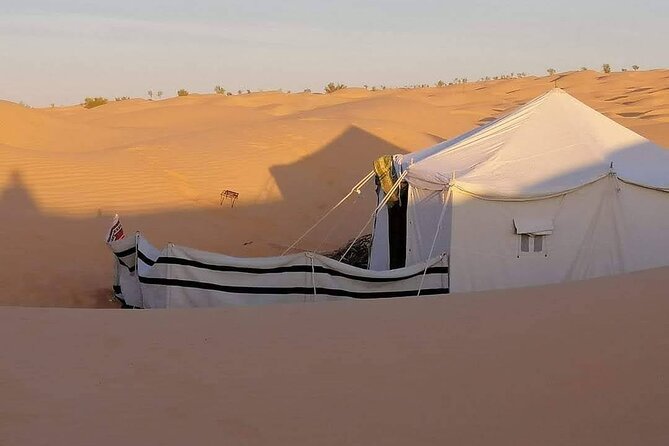 2 days tour to Douz & Ksar Ghilan oasis. and an overnight in the sahara under bedouin tent .. Dinner in the camp, Private Jeep - with english speaking guide. - Entering the Sahara near Douz