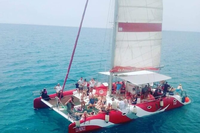 Sea Trip on Catamaran in Hammamet with Transfer - Dolphins, fruit, music, and the onboard mood
